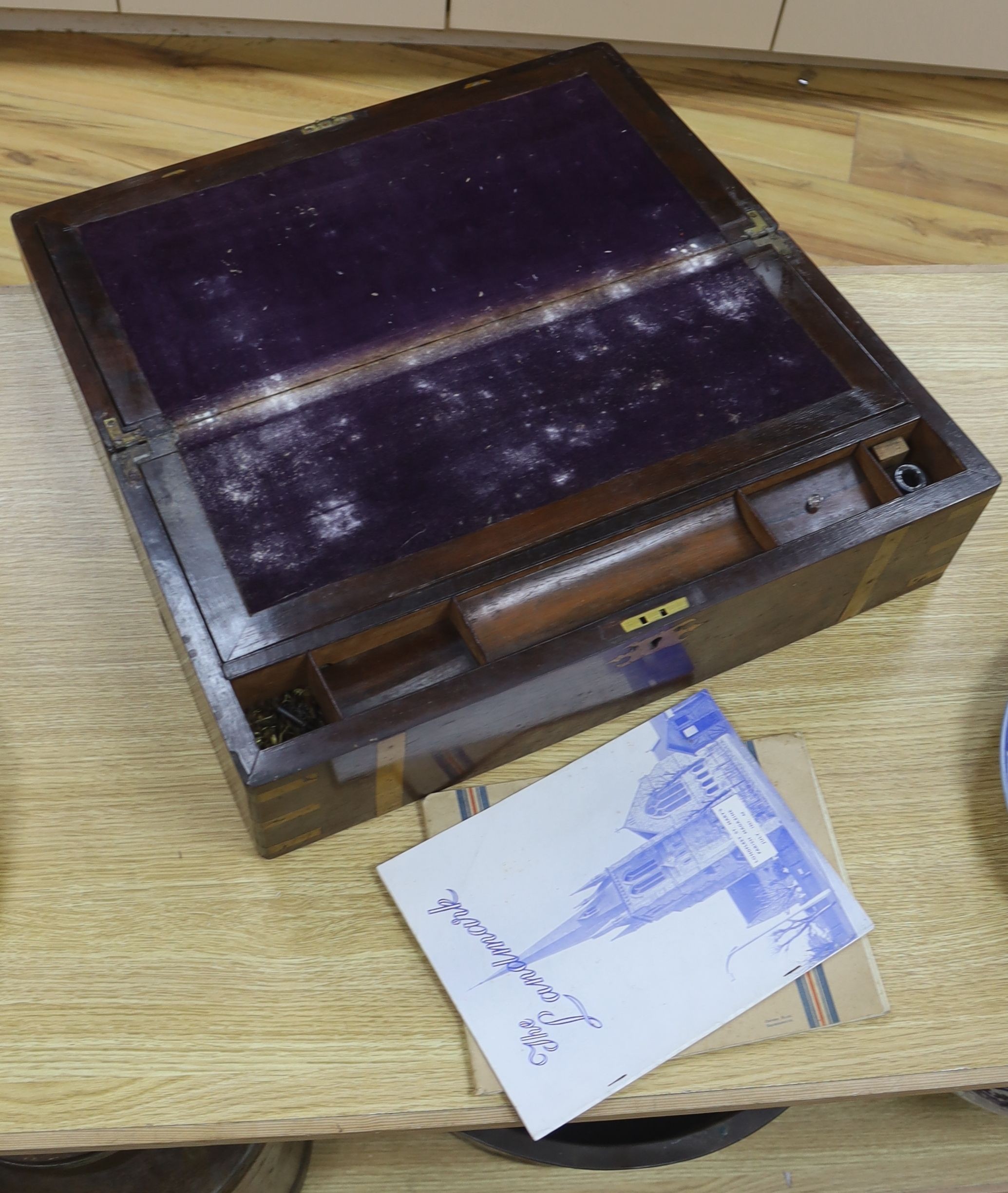 A victorian rosewood brass bound writing slope, 19 x 50cm, and a hand written Victorian ledger